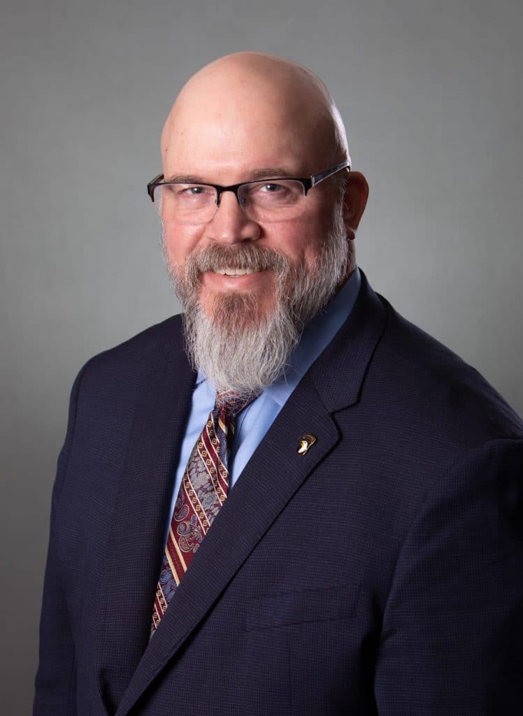 a man wearing a suit and tie