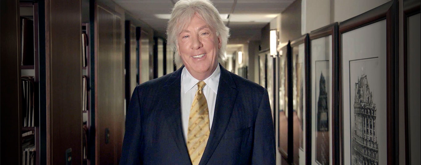 Geoffrey Fieger wearing a suit and tie