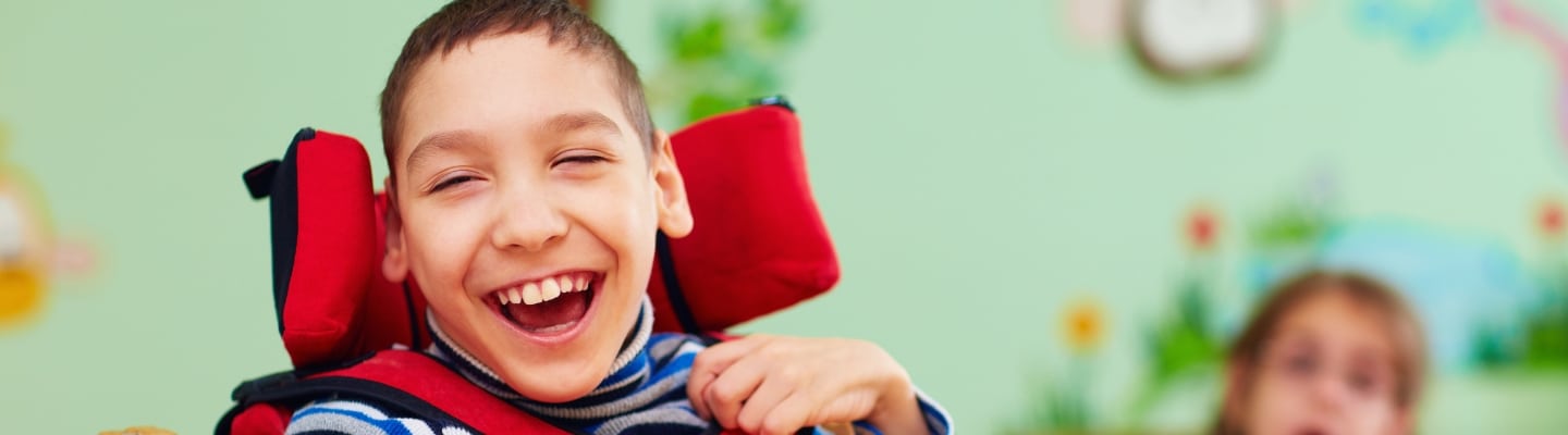 a close up of a small child with cerebral palsy.