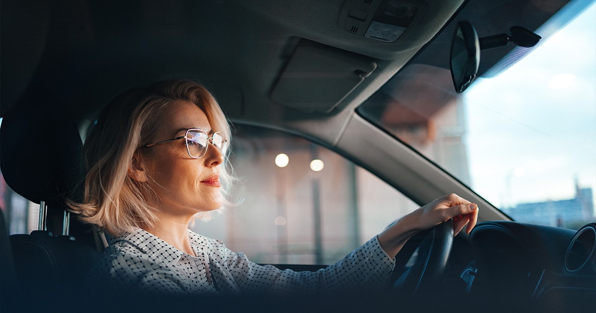 a person taking a selfie in a car