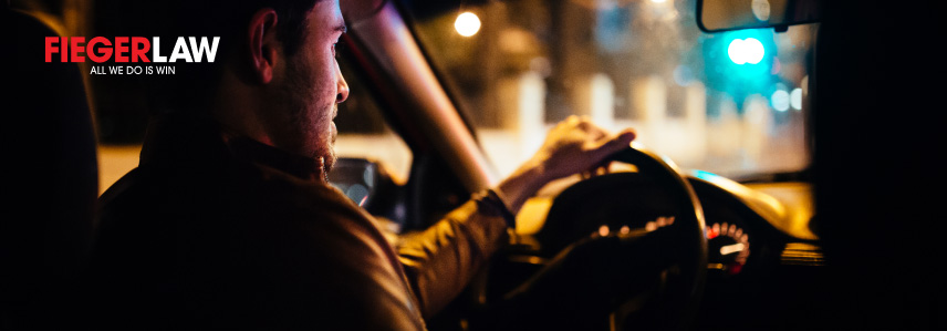 a man driving a car