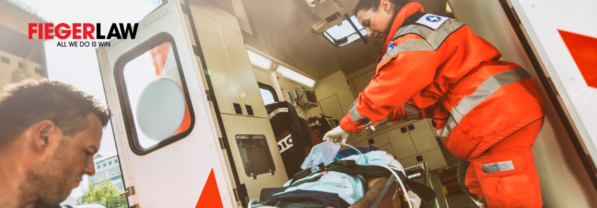 a paramedic putting oxygen on a person's body
